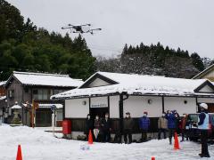 愛発地区でのドローン実証の写真