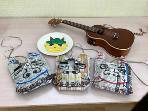 新聞と紙皿で作った鬼のお面です