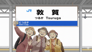 敦賀駅で写真を撮っている高齢者のイラスト