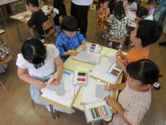 お面コーナー　自分の好きな塗り絵をしてお面を作りました